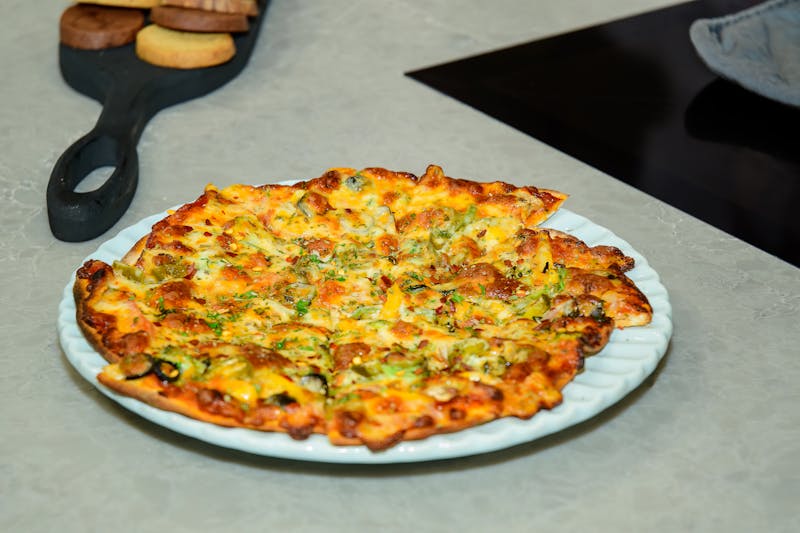 Freshly made pizza at Seasons pizza