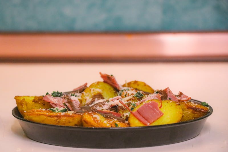 Loaded potato wedges with sour cream